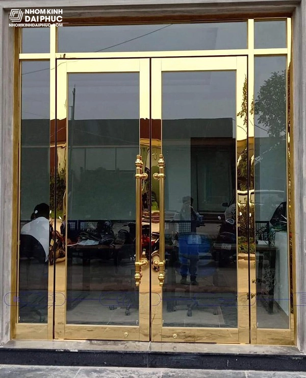 Cửa kính cường lực khung inox mạ vàng